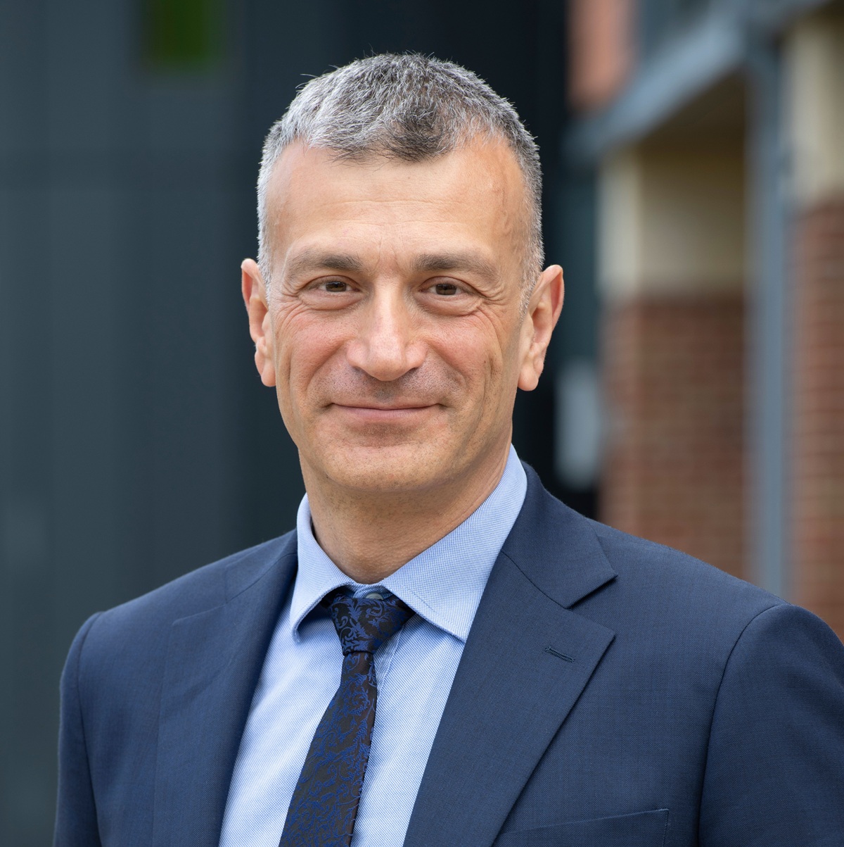Nikos Savvas OBE DL 13 Headshot of Nikos Savvas