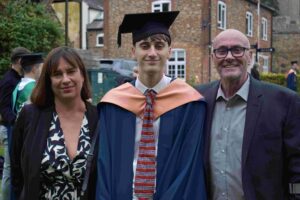 Harry Bentley (centre) with his mum and dad at the annual Eastern Education Group's graduation ceremony