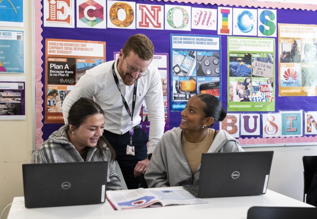 A teacher with students