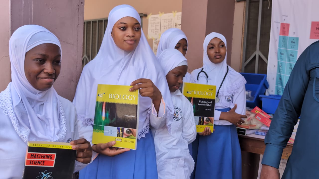 Students with donated text books