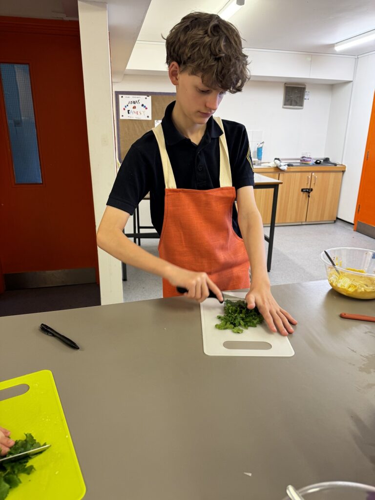 Student cooking at Chalk Hill