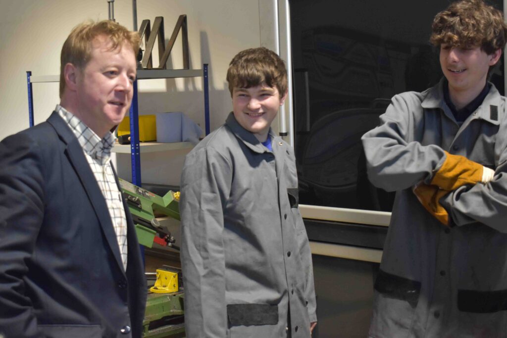 Mayor chats to two Stainless Metalcraft apprentices at the NCTC in Chatteris during national apprenticeship week