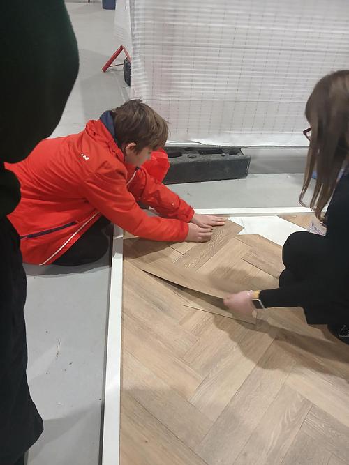 Students from Duke of Lancaster participating in educational activities.