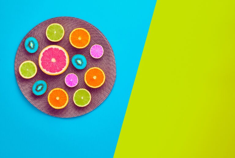 Fashion. Tropical Fruit Citrus Orange Grapefruit Lime Kiwi. Bright Color. Creative Art. Minimal. Fashion creative. Summer Beach Concept. Minimal