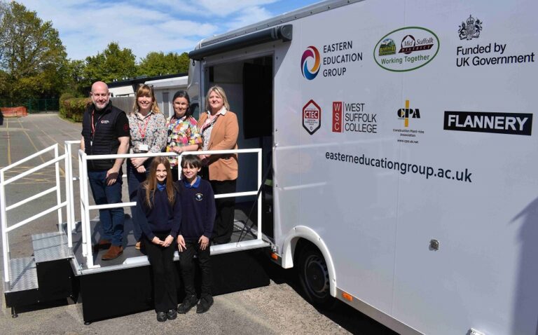 Representatives from Eastern Education Group, Babergh and Mid Suffolk District Councils and Stowupland High School by the sim van