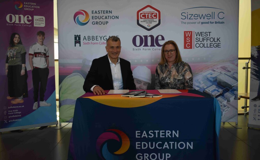 Regional education group and Sizewell C agree new partnership 5 2 Dr Nikkos Savvas OBE DL with Sarah Hancock from Sizewell C at the MOU signing between Sizewell and EEG
