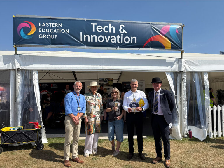 2 EEG wins award for education at Suffolk Show left Mark Tree EEG Carrie Edwards Dr Nikos Savvas OBE DL both EEG third and fourth from left others pictured unknown