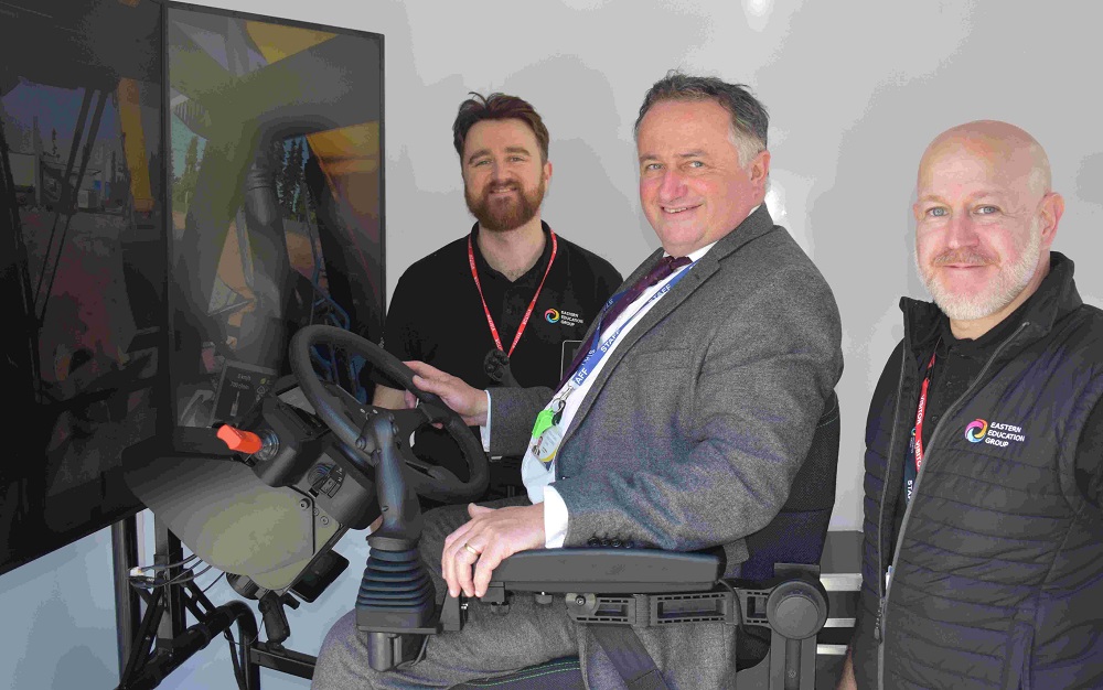 College helps bring careers to life thanks to council link up with new construction simulator van 5 Principal of Stowupland tries out the Sim Van with representatives from Eastern Education Group