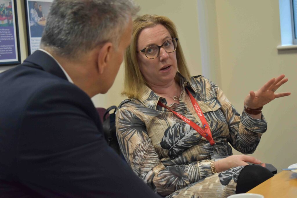 Regional education group and Sizewell C agree new partnership 4 3 Sarah Hancock in talks with Dr Nikos Savvas OBE DL at the MOU signing between EEG and Sizewell C
