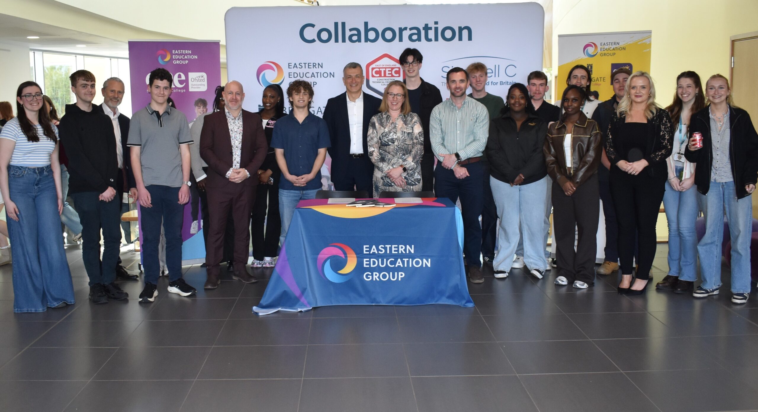 Regional education group and Sizewell C agree new partnership 1 8 students and staff from EEG with representatives from Sizewell C at the MOU in Ipswich scaled