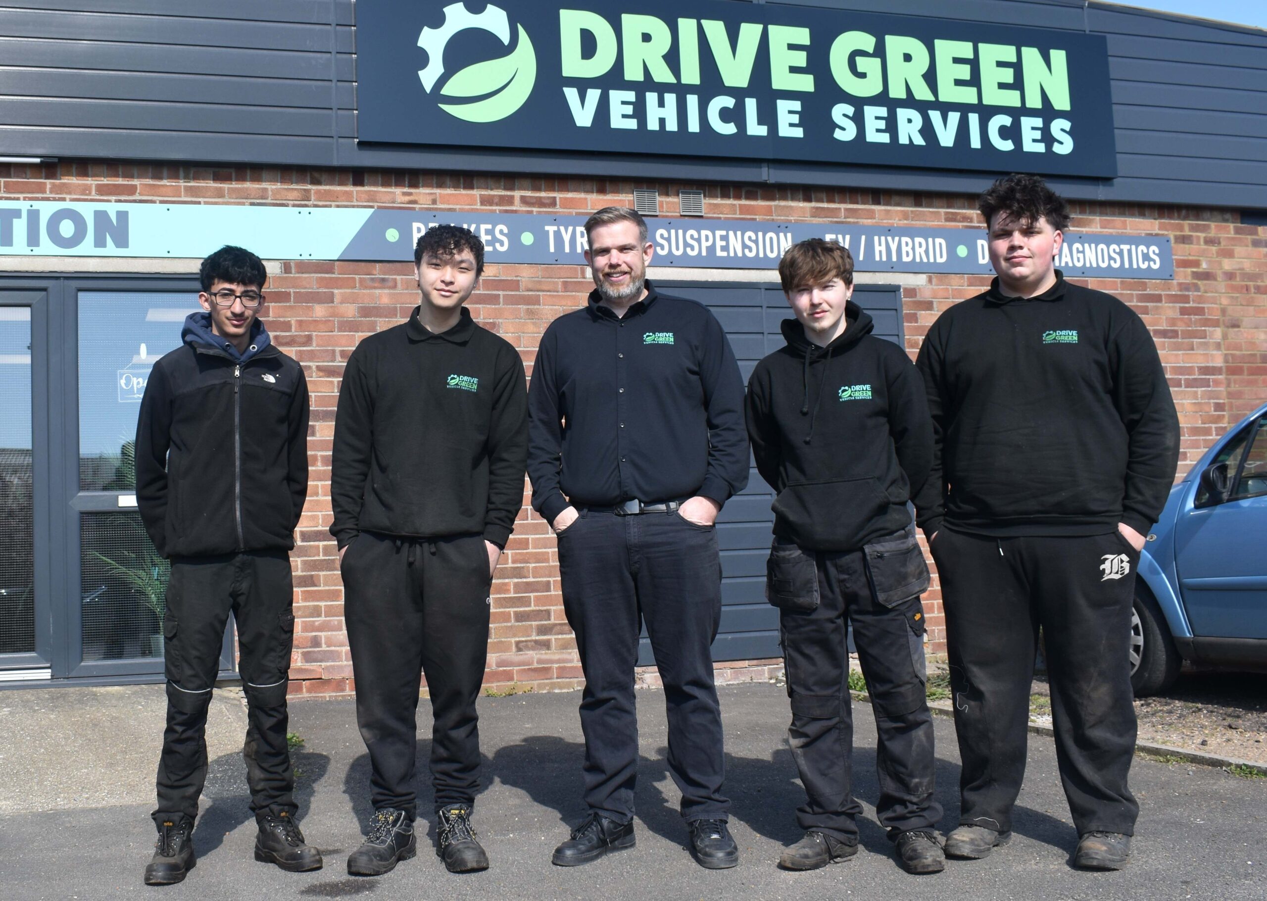 1 Dave Wilson centre with four of the five West Suffolk College students he has supported scaled