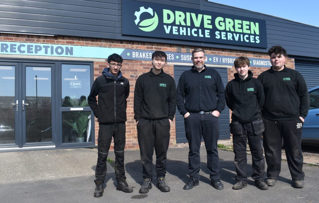 1a Dave Wilson centre with four of the five West Suffolk College students he has supported