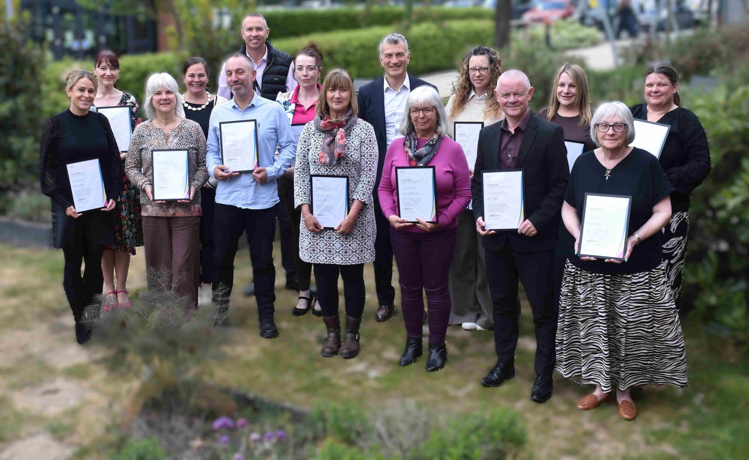 2 Long service award winners from Eastern Education Group outside Edmunds Restaurant scaled