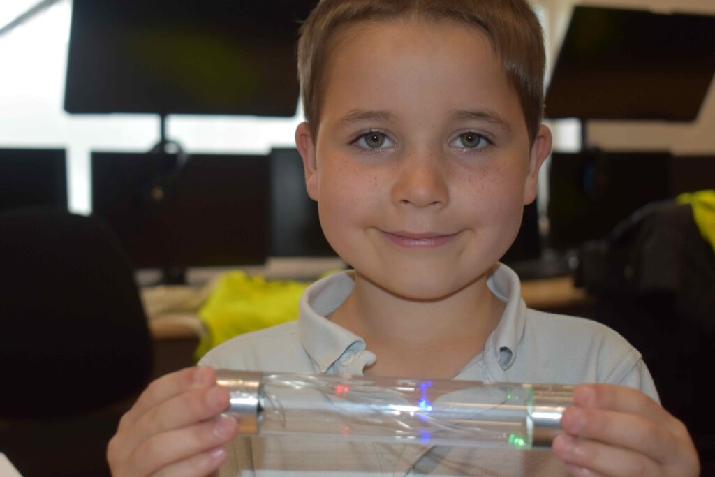 Two colleges collaborate by creating ‘unique’ careers event for kids 12 7 Isaac from Roman Hill learning about electricity
