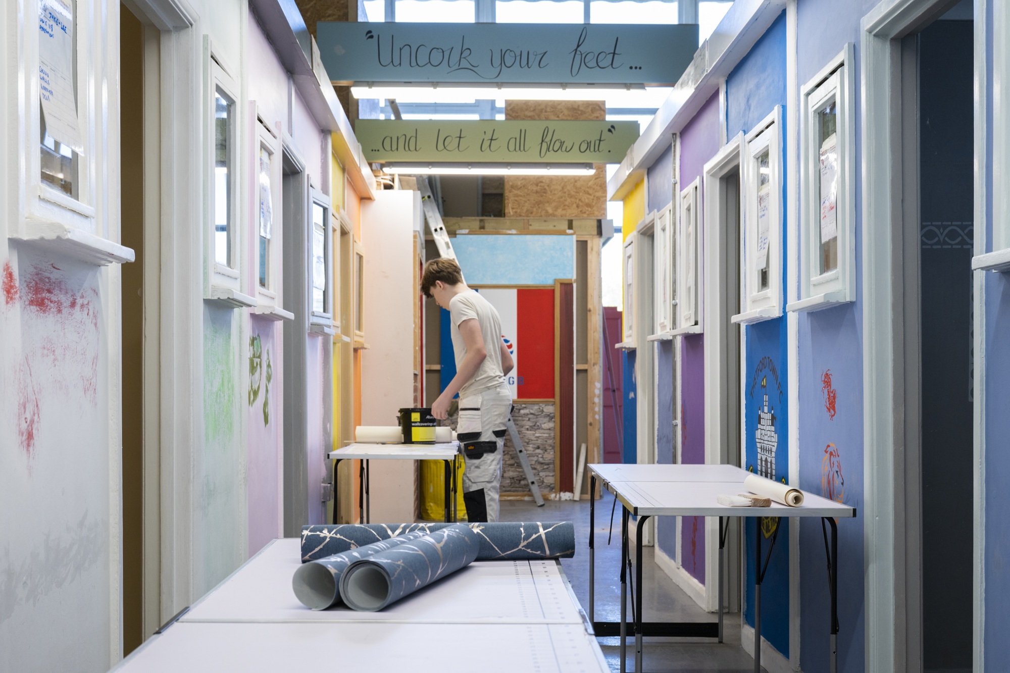 A student doing some painting an decorating