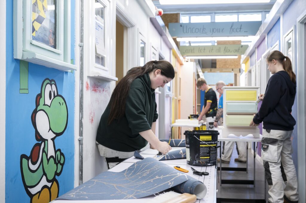Students painting and decorating