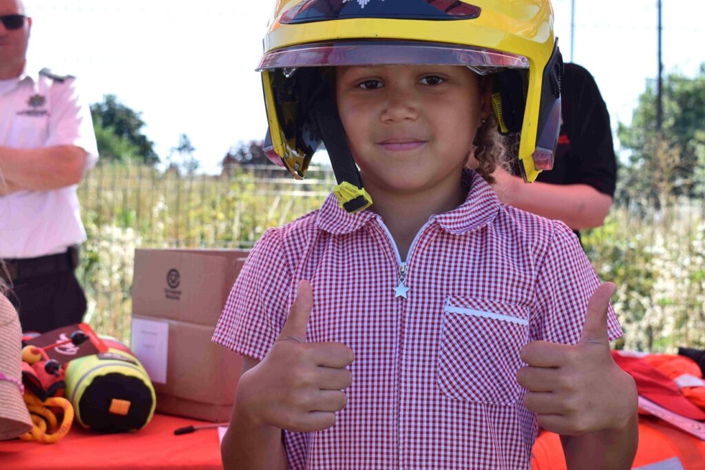 Cambridgeshire training centre gives over 150 primary school children a window into the world of work - Skills Escalator Day 11 Thumbs up for the fire service from a youngster who studies at Glebelands