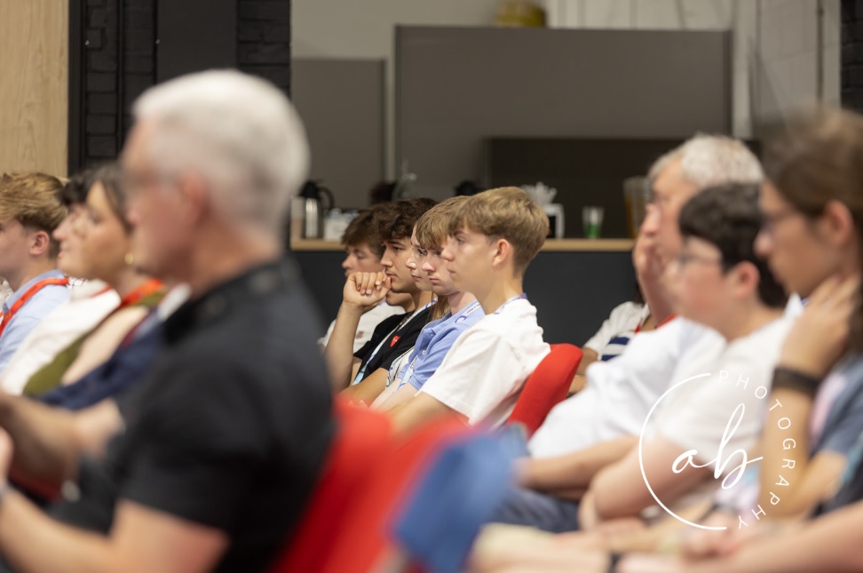 people watching a talk at the construction ambassador programme