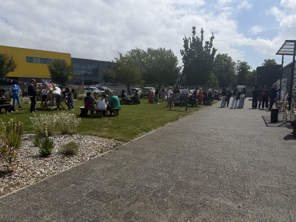 People celebrating at the refugee picnic