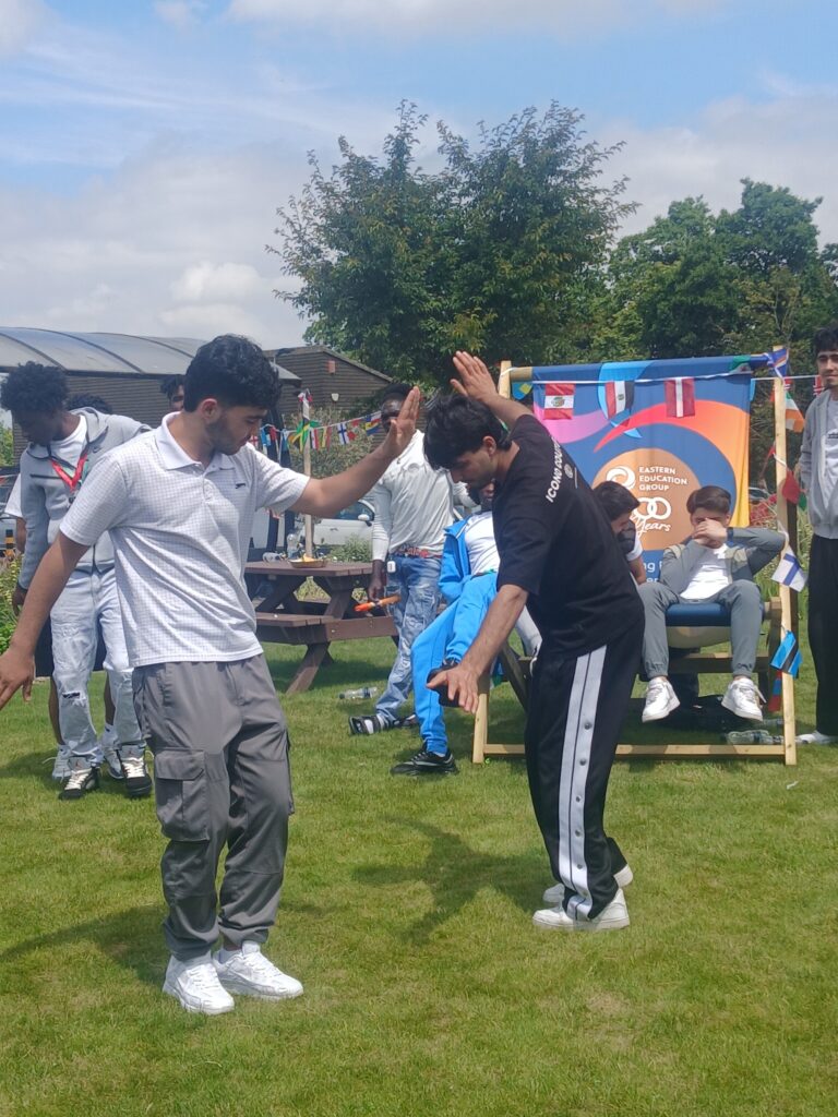 People celebrating at the refugee picnic