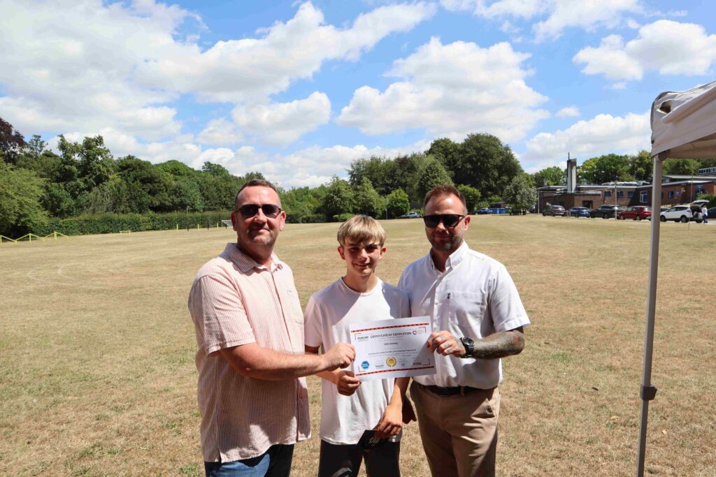 Alfie Denny 15 from Thurston receiving his certificate
