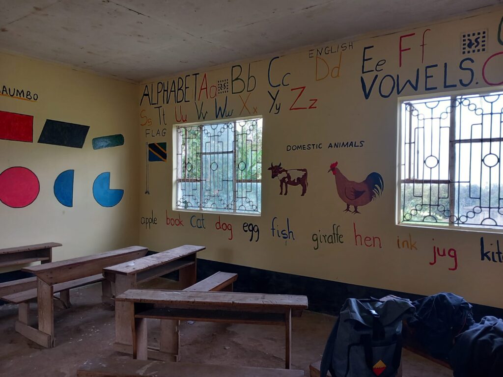 Using images from the school's only English textbook, the students added educational art to the classroom's walls
