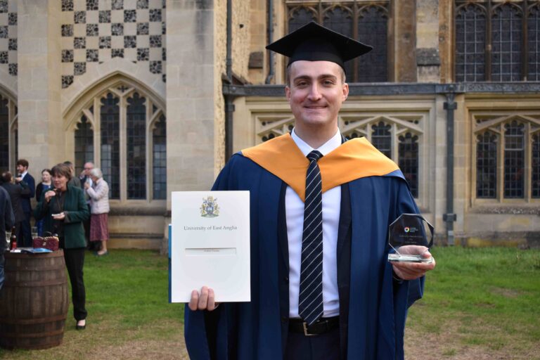 Andrew Fletcher with his degree and award from University Studies at West Suffolk College