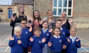Pupils with teachers at Exning Primary School