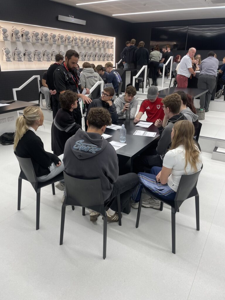 Students in the XR lab taking part in the police scrutiny panel