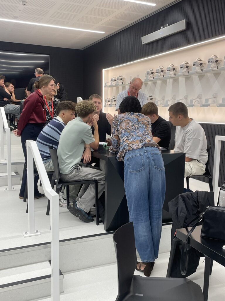 Students in the XR lab taking part in the police scrutiny panel